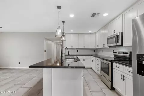 Kitchen - 4712 E Melvin St, Phoenix, AZ 85008 photo 6 of 7