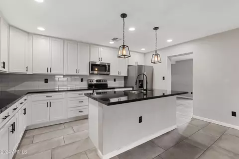 Kitchen - 4712 E Melvin St, Phoenix, AZ 85008 photo 5 of 7