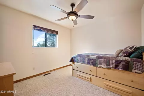 Bedroom - 2780 E Doolittle Cir, Overgaard, AZ 85933 photo 5 of 6
