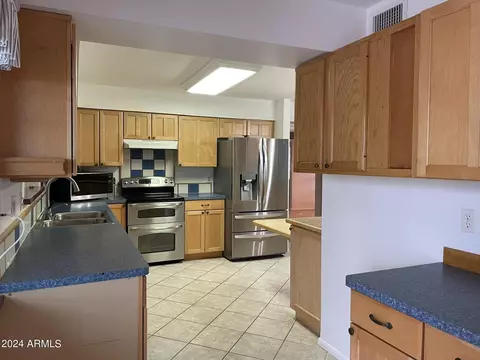 Kitchen - 1032 E Irvine Rd, Phoenix, AZ 85086 photo 3 of 10
