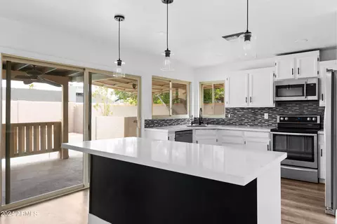 Kitchen - 4816 E Capistrano Ave, Phoenix, AZ 85044 photo 3 of 6