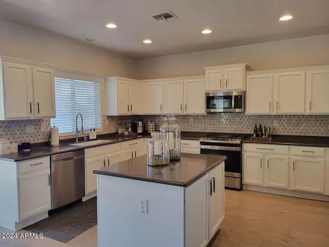 Kitchen - 1705 W Gambit Trl, Phoenix, AZ 85085 photo 1 of 2
