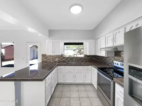 Kitchen - 1424 E Saint Catherine Ave, Phoenix, AZ 85042 photo 1 of 3