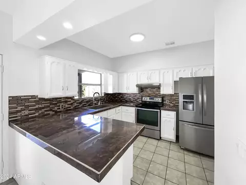 Kitchen - 1424 E Saint Catherine Ave, Phoenix, AZ 85042 photo 2 of 3