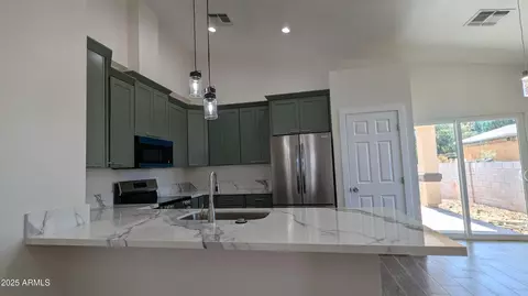 Kitchen - 505 E Clanton Ave, Buckeye, AZ 85326 photo 7 of 7