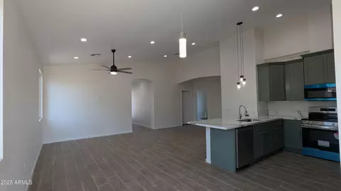 Living - 505 E Clanton Ave, Buckeye, AZ 85326 photo 3 of 3