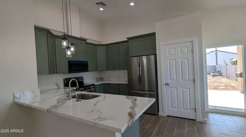 Kitchen - 505 E Clanton Ave, Buckeye, AZ 85326 photo 6 of 7