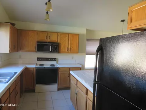 Kitchen - 3626 E Thunderhill Pl, Phoenix, AZ 85044 photo 3 of 5