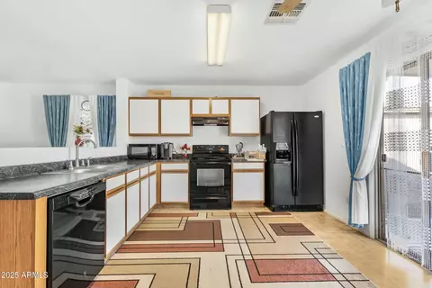 Kitchen - 43556 W Colby Dr, Maricopa, AZ 85138 photo 1 of 2