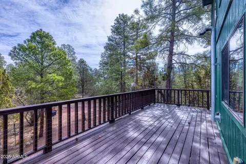 Exterior - 3334 Whispering Pine Dr, Overgaard, AZ 85933 photo 1 of 2