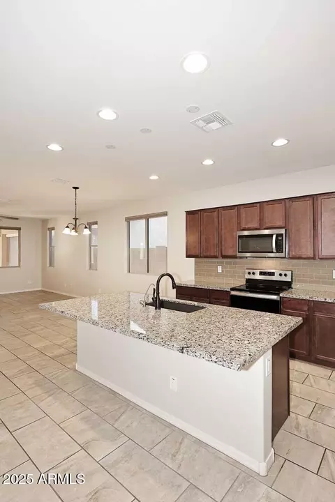 Kitchen - 10065 E Tiger Lily Ave, Mesa, AZ 85212 photo 3 of 4