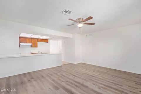 Living - 8640 W Mitchell Dr, Phoenix, AZ 85037 photo 7 of 9
