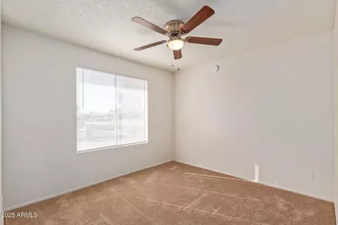 Bedroom - 8640 W Mitchell Dr, Phoenix, AZ 85037 photo 4 of 5