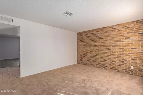 Living - 8640 W Mitchell Dr, Phoenix, AZ 85037 photo 4 of 9