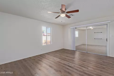 Living - 8640 W Mitchell Dr, Phoenix, AZ 85037 photo 5 of 9