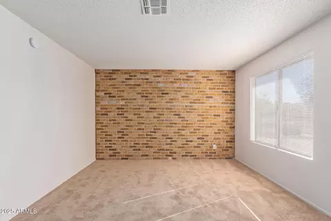 Living - 8640 W Mitchell Dr, Phoenix, AZ 85037 photo 3 of 9