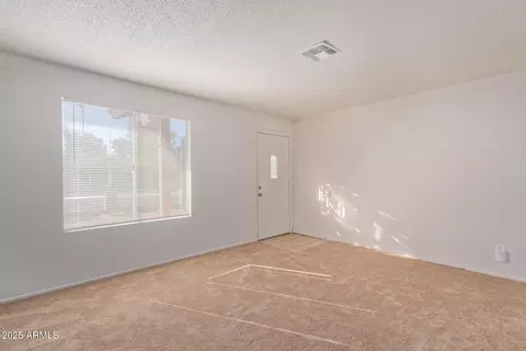 Living - 8640 W Mitchell Dr, Phoenix, AZ 85037 photo 1 of 9