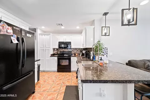 Kitchen - 8657 E Capri Ave, Mesa, AZ 85208 photo 2 of 5