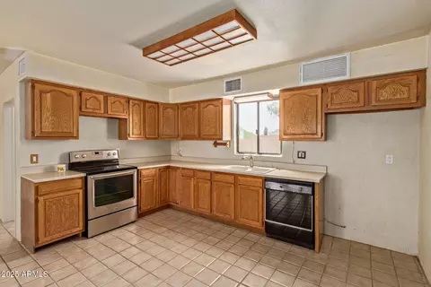 Kitchen - 2131 E Rose Garden Ln, Phoenix, AZ 85024 photo 1 of 2