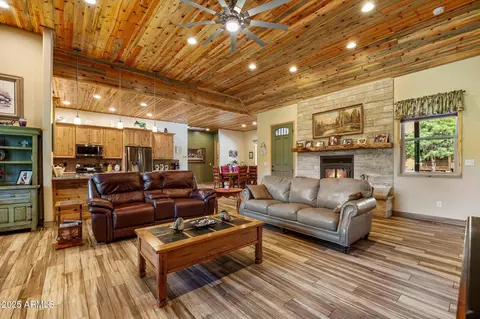 Living - 2352 Immelman Cir, Overgaard, AZ 85933 photo 3 of 4
