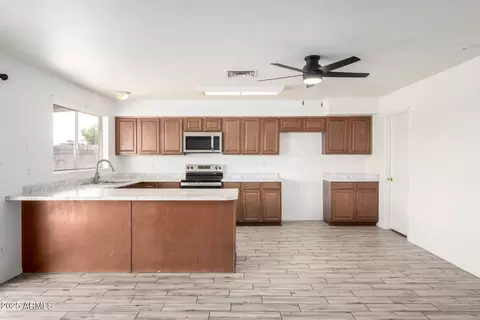 Kitchen - 2551 E Harmony Ave, Mesa, AZ 85204 photo 1 of 3