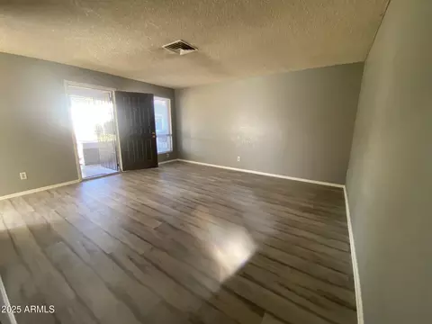 Living - 4820 N 89th Ave #88, Phoenix, AZ 85037 photo 1 of 3