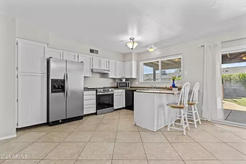 Kitchen - 2435 E Harmony Ave, Mesa, AZ 85204 photo 2 of 3