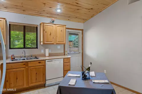 Kitchen - 2353 S Buffalo Loop, Overgaard, AZ 85933 photo 2 of 2