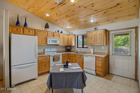 Kitchen - 2353 S Buffalo Loop, Overgaard, AZ 85933 photo 1 of 2