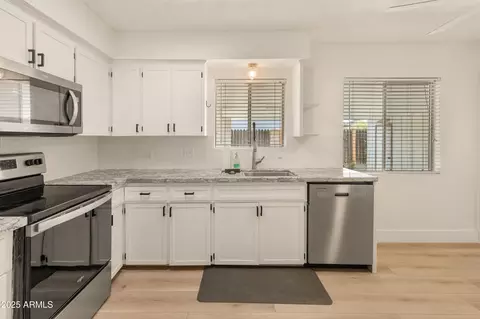 Kitchen - 1407 E Mountain View Rd, Phoenix, AZ 85020 photo 2 of 4