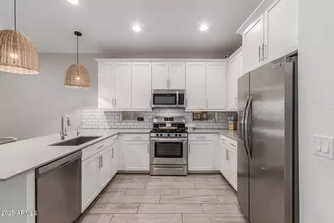 Kitchen - 9642 E Tesla Ave, Mesa, AZ 85212 photo 3 of 3
