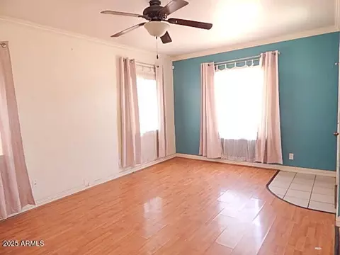 Living - 409 E Narramore Ave, Buckeye, AZ 85326 photo 1 of 1