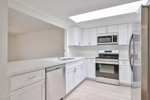 Kitchen - 2419 E Desert Cactus St, Phoenix, AZ 85032 photo 1 of 3