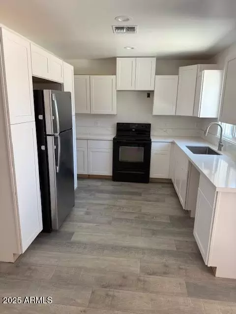 Kitchen - 1164 E Jarvis Ave E, Mesa, AZ 85204 photo 1 of 2