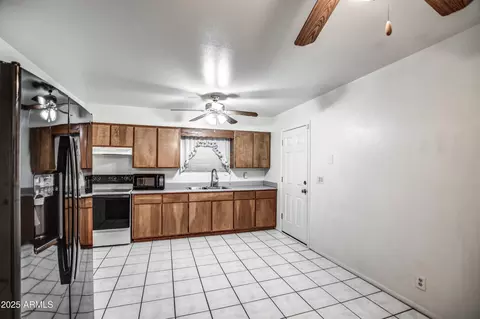 Kitchen - 9111 E Crescent Ave, Mesa, AZ 85208 photo 3 of 3