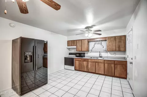 Kitchen - 9111 E Crescent Ave, Mesa, AZ 85208 photo 1 of 3