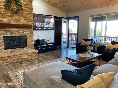 Living - 2721 High Pine Loop, Overgaard, AZ 85933 photo 3 of 4