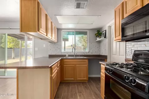 Kitchen - 714 E Harmony Ave, Mesa, AZ 85204 photo 1 of 2