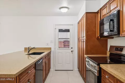 Kitchen - 313 E Riviera Dr, Tempe, AZ 85282 photo 2 of 3