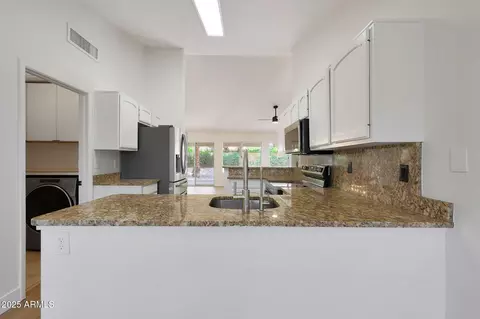 Kitchen - 4520 E Desert Cactus St, Phoenix, AZ 85032 photo 1 of 5