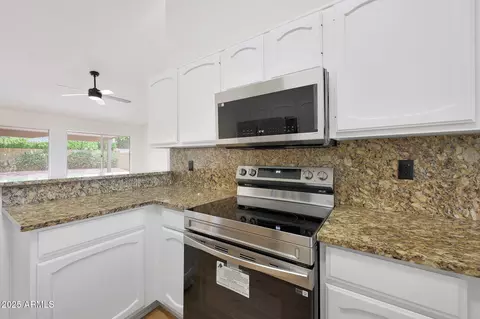 Kitchen - 4520 E Desert Cactus St, Phoenix, AZ 85032 photo 3 of 5