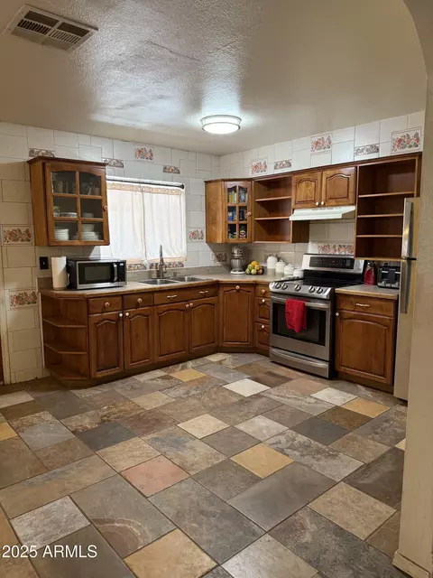 Kitchen - 1627 W Carson Rd, Phoenix, AZ 85041 photo 3 of 5