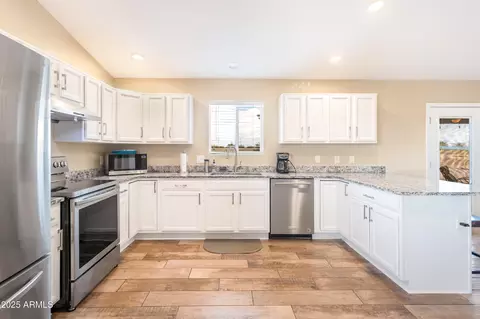 Kitchen - 10293 E White Wolf Run, Hereford, AZ 85615 photo 3 of 5