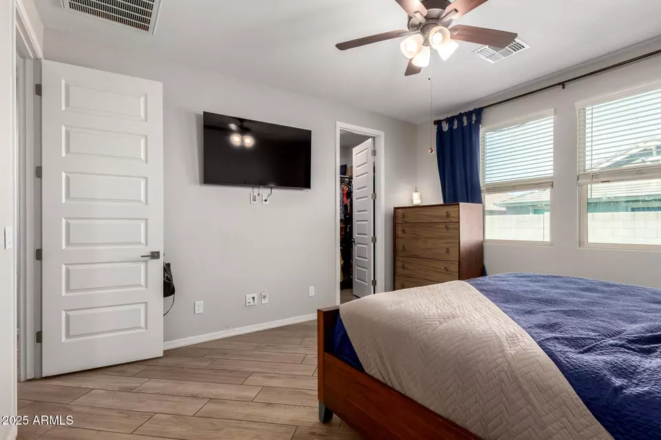 Bedroom - 15240 W Latham St, Goodyear, AZ 85338 photo 3 of 7
