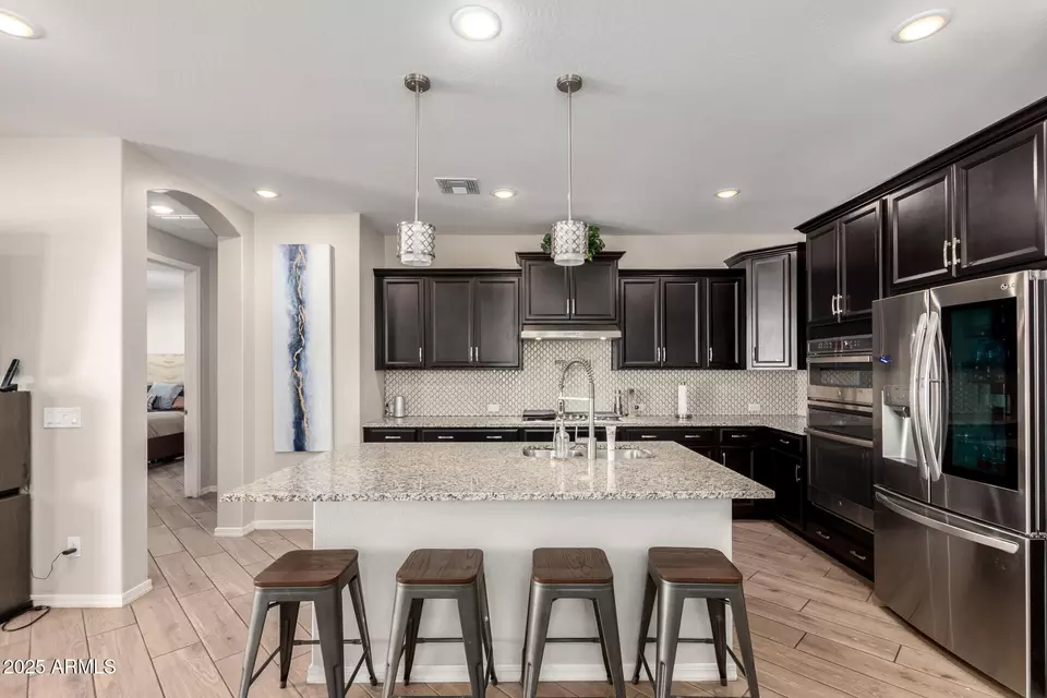 Kitchen - 15240 W Latham St, Goodyear, AZ 85338 photo 3 of 5