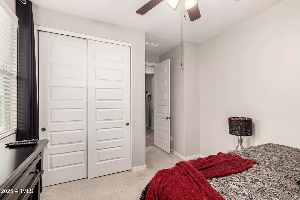 Bedroom - 15240 W Latham St, Goodyear, AZ 85338 photo 6 of 7
