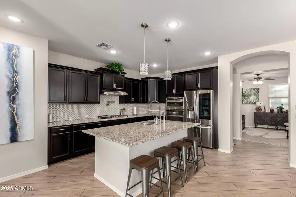 Kitchen - 15240 W Latham St, Goodyear, AZ 85338 photo 4 of 5