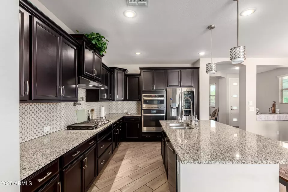 Kitchen - 15240 W Latham St, Goodyear, AZ 85338 photo 5 of 5