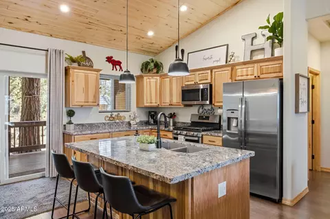 Kitchen - 2234 Fairway Dr, Overgaard, AZ 85933 photo 2 of 2