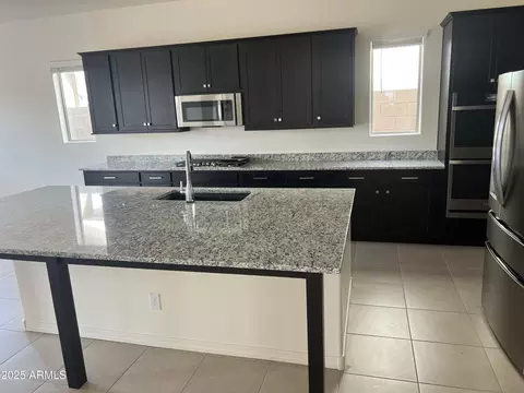 Kitchen - 9744 E Spiral Ave, Mesa, AZ 85212 photo 6 of 6